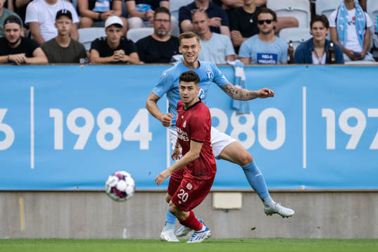 Kerem Kesgin of Sivasspor and Felix Beijmo of Malmö FF