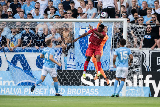 Goalkeeper Johan Dahlin of Malmö FF and Leke James of