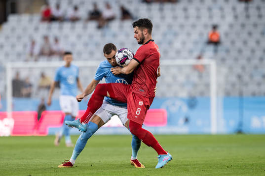 Veljko Birmancevic of Malmö FF and Robin Yalcin of