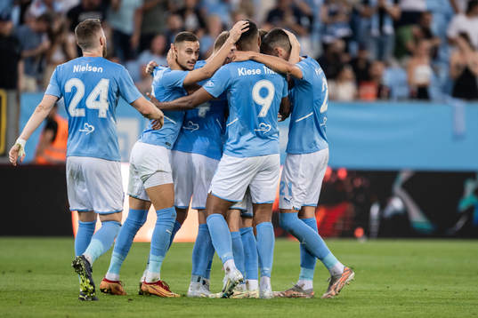 Niklas Moisander of Malmö FF celebrates with teammates