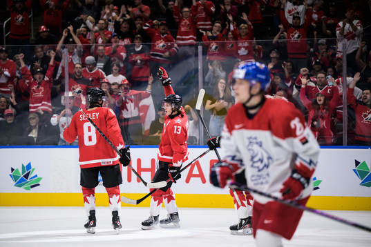 Ronan Seeley and Kent Johnson of Canada celebrate the 1-0