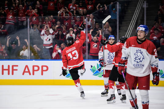 Kent Johnson of Canada celebrates