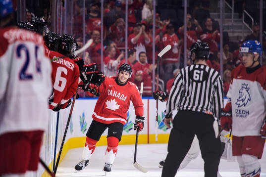 Logan Stankoven of Canada celebrate his 3-0 goal