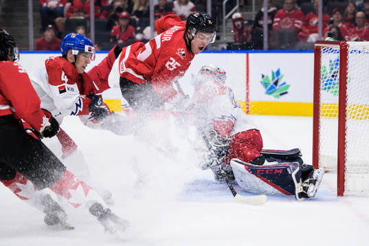 William Dufour of Canada challenges Jiri Tichacek and