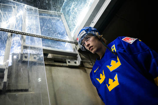 Simon Edvinsson of Sweden walks out to the ice for warm-up