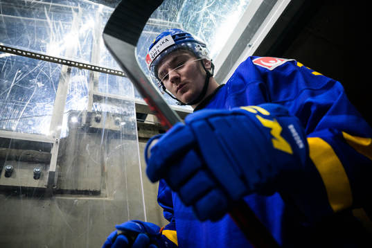 Helge Grans of Sweden walks out to the ice for warm-up