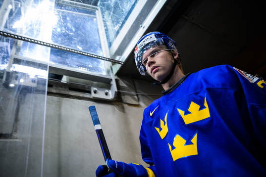 Albert Sjöberg of Sweden walks out to the ice for warm-up