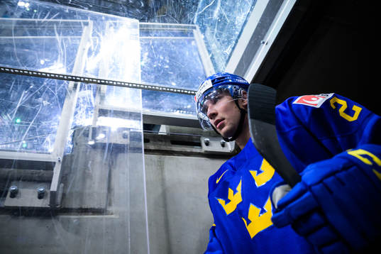 Daniel Torgersson of Sweden walks out to the ice for warm-up