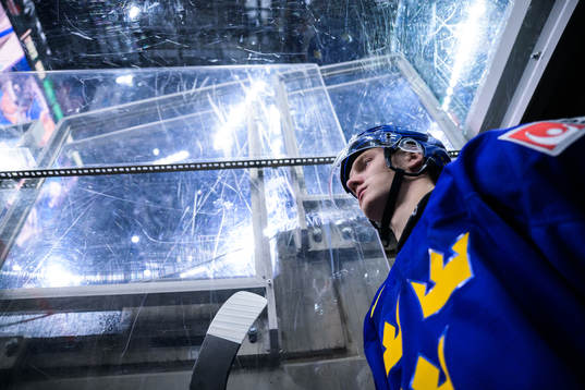 Linus Sjödin of Sweden walks out to the ice for warm-up