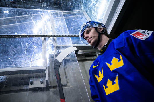 Simon Edvinsson of Sweden walks out to the ice for warm-up