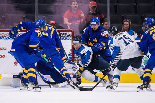 Roni Karvinen and Juuso Mäenpää of Sweden in front of