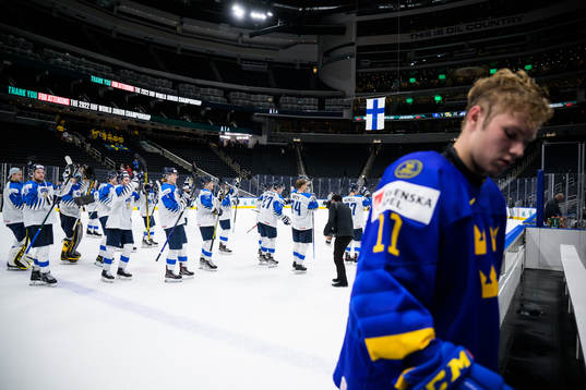 Fabian Lysell of Sweden looks dejected as players of