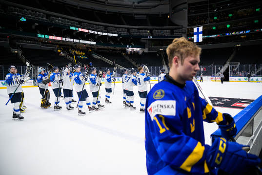 Fabian Lysell of Sweden looks dejected as players of