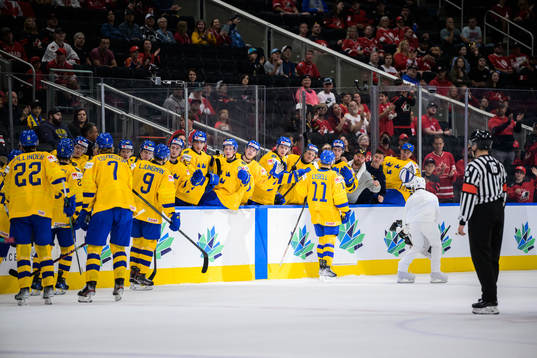Fabian Lysell of Sweden celebrates with teammates