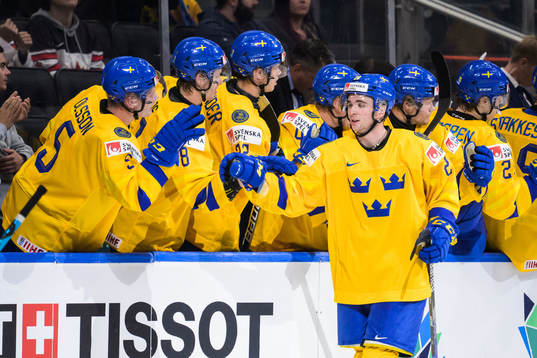 Isak Rosén of Sweden celebrates with teammates