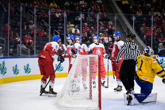 Michal Gut of Czech Republic celebrates with teammates