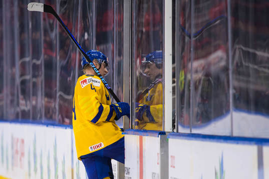 Emil Andrae of Sweden steps into the penalty box