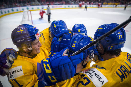 Linus Sjödin of Sweden celebrates with teammates