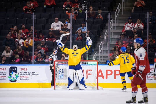Goaltender Jesper Wallstedt of Sweden celebrates