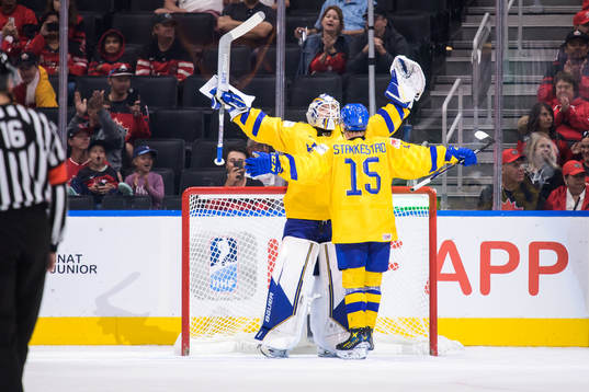Goaltender Jesper Wallstedt and Åke Stakkestad of Sweden