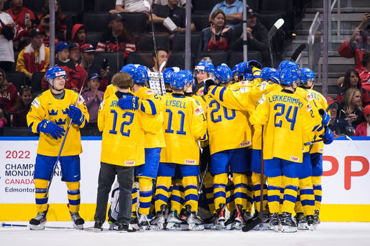 Players of Sweden celebrate