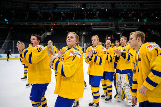 Emil Andrae of Sweden celebrates with teammates