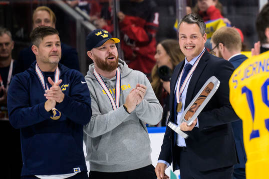 head coach Tomas Montén of Sweden with the trophy
