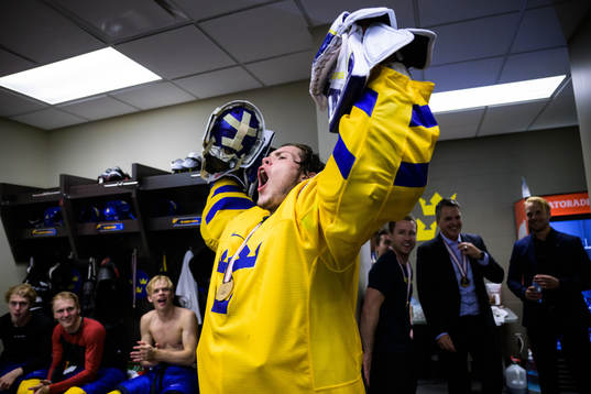 Goaltender Jesper Wallstedt of Sweden celebrates