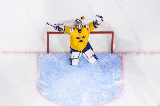 Goaltender Jesper Wallstedt of Sweden celebrates at the
