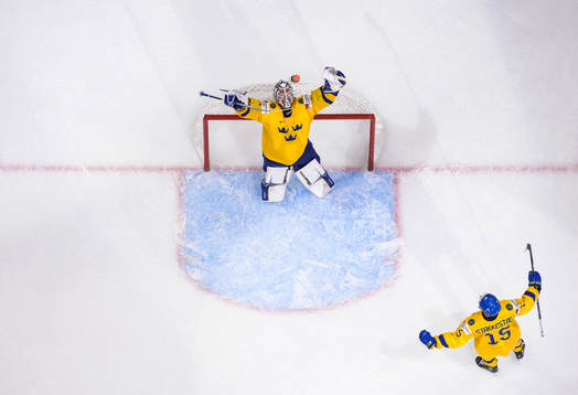 Goaltender Jesper Wallstedt and Åke Stakkestad of Sweden