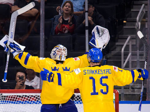 Goaltender Jesper Wallstedt and Åke Stakkestad of Sweden