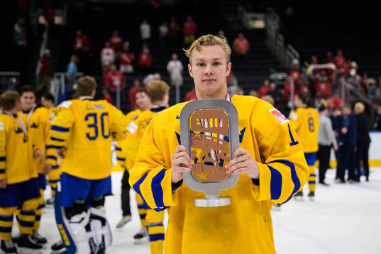 Fabian Lysell of Sweden poses with the bronze trophy