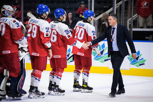 Head coach Tomas Montén of Sweden greets Czech players