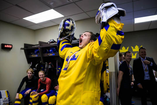 Goaltender Jesper Wallstedt of Sweden celebrates