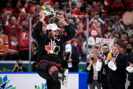 Mason McTavish of Canada celebrates with the winner’s