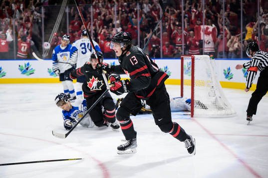 Kent Johnson of Canada celebrates