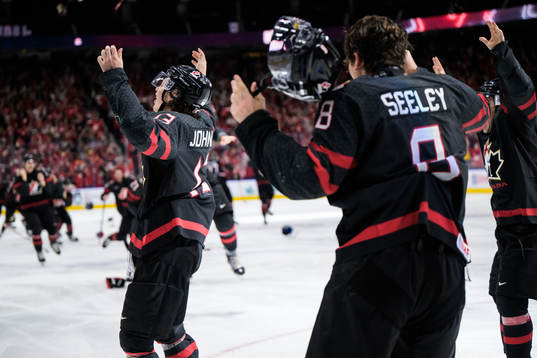 Kent Johnson and Ronan Seeley of Canada celebrate the game