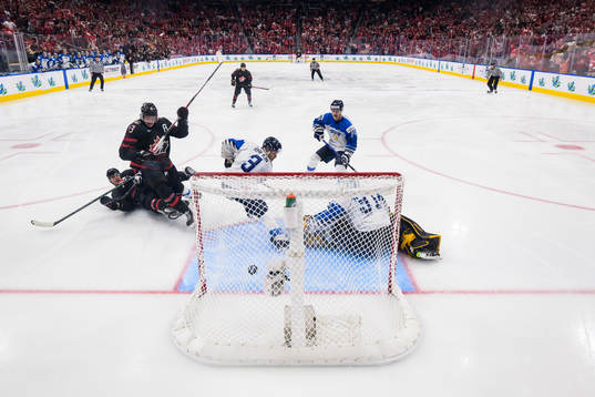 Kent Johnson of Canada scores the game winning 3-2 goal in