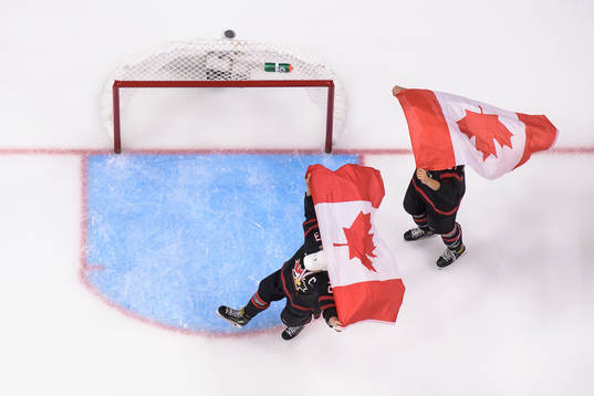 Mason McTavish and Will Cuylle of Canada celebrate with