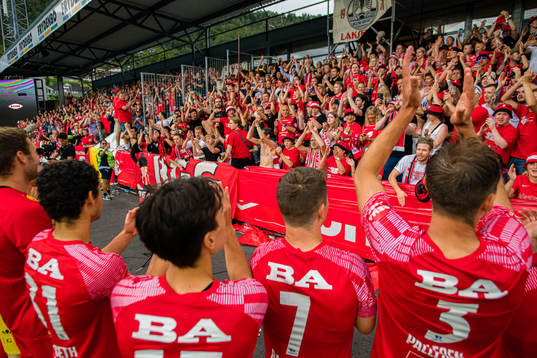 Spectators in the stands celebrates