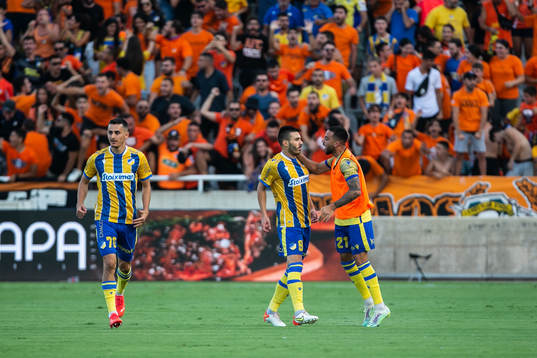 Anton Maglica and Dimitris Theodorou of Apoel celebrate