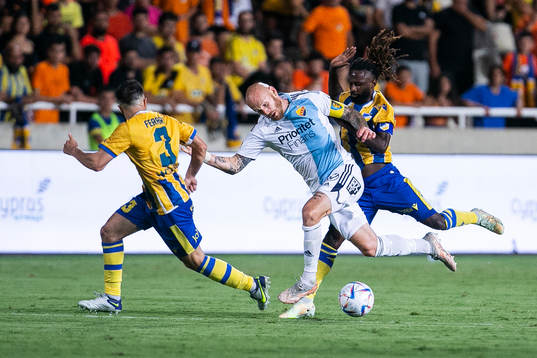 Franco Ariel Ferrari and Dieumerci Ndongala of Apoel and