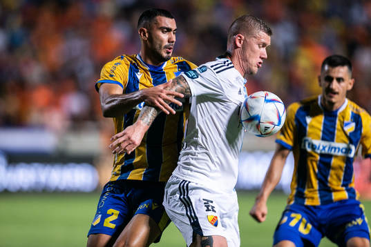 Andreas Karo of Apoel and Victor Edvardsen of Djurgården