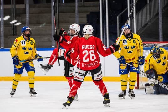 Evelina Raselli of Switzerland celebrates scoring 1-1