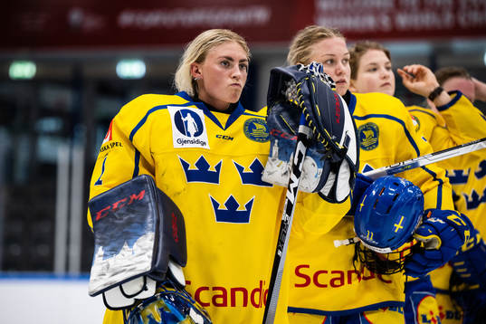 goaltender Ida Boman and Josefin Bouveng of Sweden