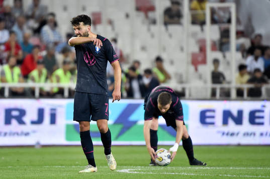 Erdal Rakip looks dejected