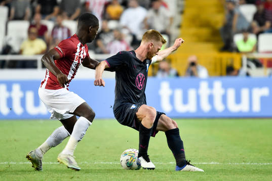 Max-Alain Gradel of Sivasspor and Anders Christiansen of