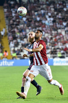 Jo Inge Berget of Malmö FF and Uğur Çiftçi of Slovacko