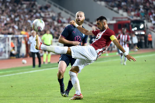 Jo Inge Berget of Malmö FF and Uğur Çiftçi of Slovacko