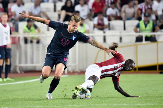 Felix Beijmo of Malmö FF and Max-Alain Gradel of Sivasspor